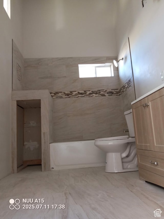 10960 N Anderson Way, Tremonton, UT 84337 - bathroom featuring shower / tub combination and marble finish floors
