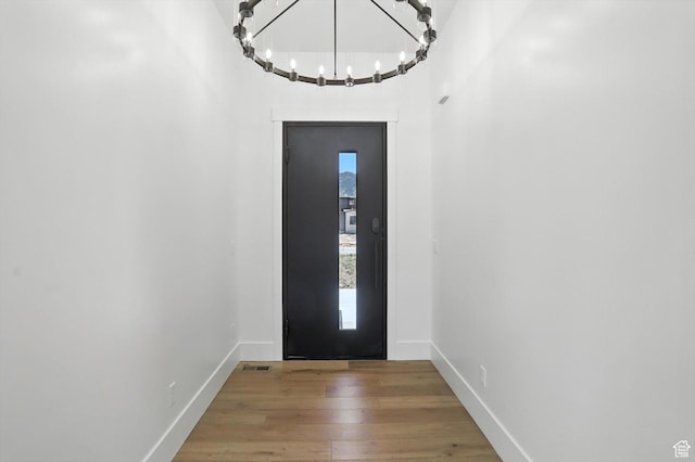 3248 E 5225 N Unit 5, Liberty, UT 84310 - entrance foyer with a chandelier and wood finished floors