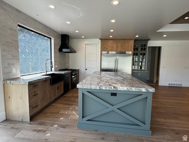 3248 E 5225 N Unit 5, Liberty, UT 84310 - kitchen featuring stainless steel built in fridge, wall chimney exhaust hood, a sink, range with gas cooktop, and recessed lighting