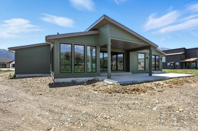 3248 E 5225 N Unit 5, Liberty, UT 84310 - back of house with a patio area