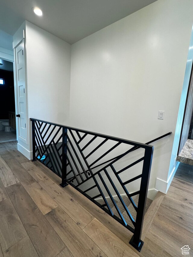 3248 E 5225 N Unit 5, Liberty, UT 84310 - stairway featuring wood finished floors, baseboards, and recessed lighting