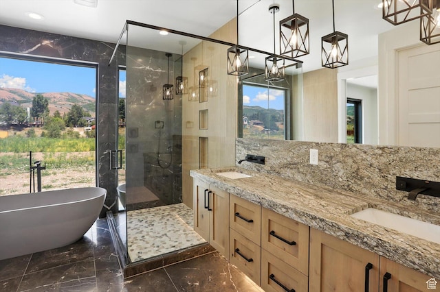 3248 E 5225 N Unit 5, Liberty, UT 84310 - bathroom with marble tiled floors, a shower stall, a chandelier, a freestanding bath, and recessed lighting