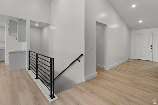 835 E 240 N Unit 16, Tremonton, UT 84337 - corridor featuring an upstairs landing, light wood finished floors, recessed lighting, baseboards, and lofted ceiling