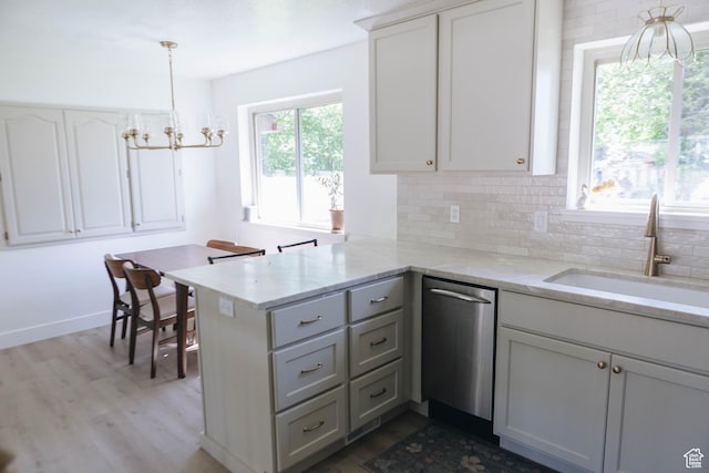 354 S 1100 E, Springville, UT 84663 - kitchen featuring dishwasher, a sink, tasteful backsplash, dark wood finished floors, and a chandelier