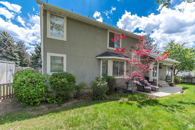 2825 Elk Horn Ln, Cottonwood Heights, UT 84093 - back of house with stucco siding and a patio