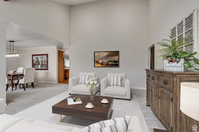 2825 Elk Horn Ln, Cottonwood Heights, UT 84093 - living area with light carpet, baseboards, a high ceiling, crown molding, and healthy amount of natural light