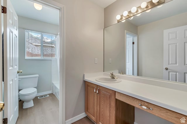 2825 Elk Horn Ln, Cottonwood Heights, UT 84093 - full bath featuring vanity, toilet, wood finished floors, and baseboards
