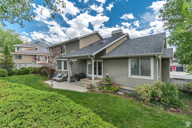 2825 Elk Horn Ln, Cottonwood Heights, UT 84093 - back of property with stucco siding, roof with shingles, a patio area, french doors, and an outdoor hangout area