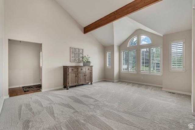 2825 Elk Horn Ln, Cottonwood Heights, UT 84093 - unfurnished living room featuring light carpet, baseboards, high vaulted ceiling, and beamed ceiling