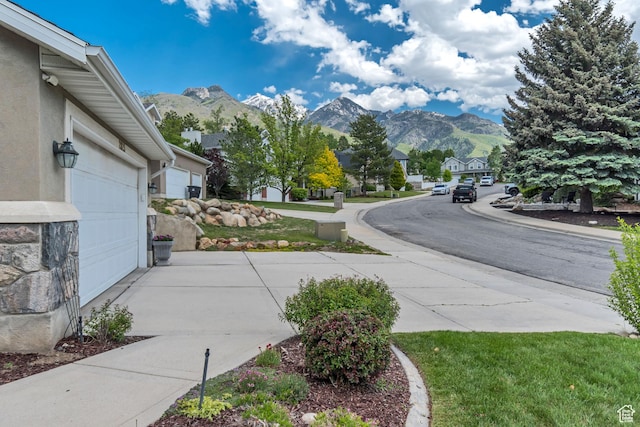 2825 Elk Horn Ln, Cottonwood Heights, UT 84093 - view of street with a mountain view, a residential view, sidewalks, and curbs