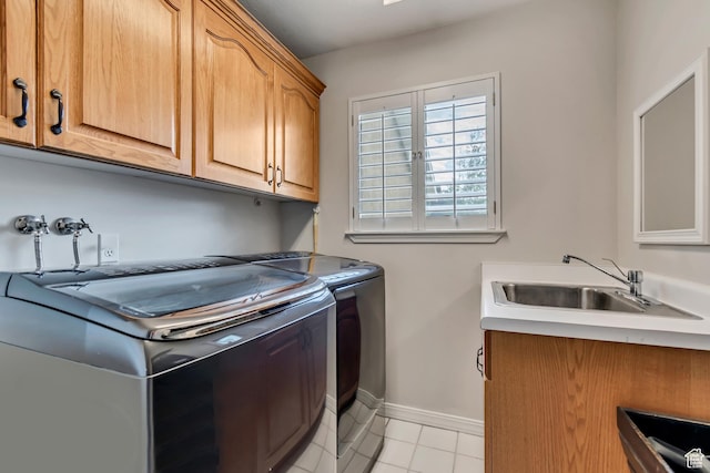 2825 Elk Horn Ln, Cottonwood Heights, UT 84093 - washroom with cabinet space, independent washer and dryer, light tile patterned flooring, and baseboards