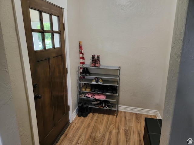 853 E 27th St, Ogden, UT 84403 - foyer entrance featuring wood finished floors and baseboards