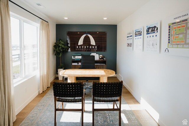 589 W 1810 N Unit 66, Salem, UT 84653 - dining space with light wood-style flooring, a desk, and baseboards