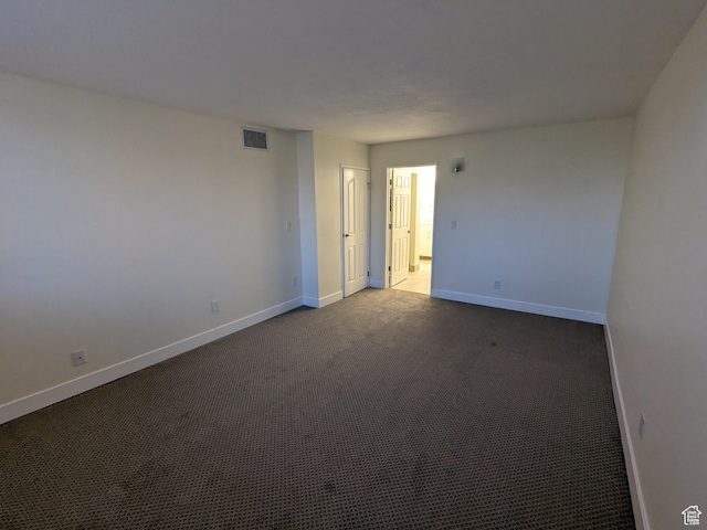 241 N Vine St W Unit 404E, Salt Lake City, UT 84103 - carpeted empty room featuring baseboards