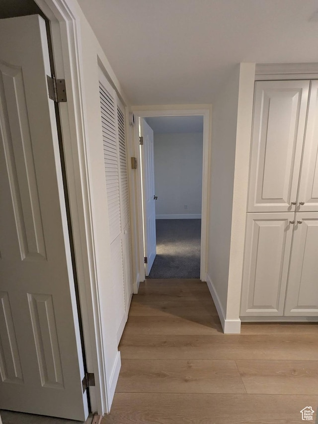 241 N Vine St W Unit 404E, Salt Lake City, UT 84103 - corridor featuring baseboards and light wood-style flooring