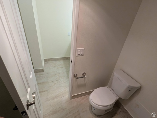 241 N Vine St W Unit 404E, Salt Lake City, UT 84103 - bathroom with baseboards and toilet