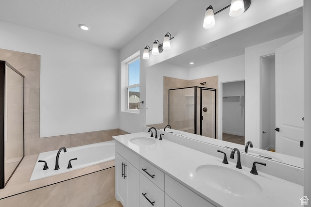 1089 S 3170 E Unit 205, Spanish Fork, UT 84660 - full bath with a shower stall, a bath, double vanity, a walk in closet, and recessed lighting