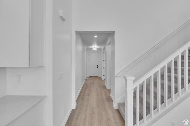 1089 S 3170 E Unit 205, Spanish Fork, UT 84660 - hall featuring light wood finished floors and stairs