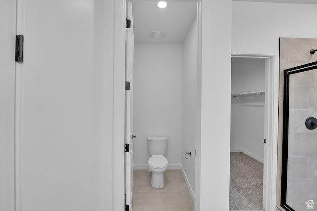1089 S 3170 E Unit 205, Spanish Fork, UT 84660 - full bathroom with a shower stall, a walk in closet, and tile patterned floors