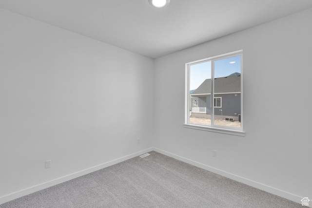 1089 S 3170 E Unit 205, Spanish Fork, UT 84660 - unfurnished room with baseboards and carpet flooring