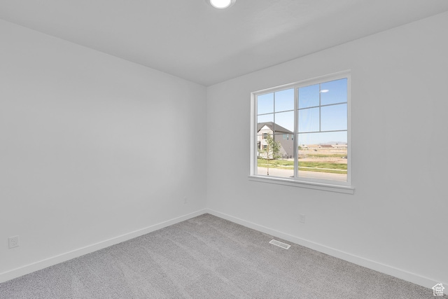 1089 S 3170 E Unit 205, Spanish Fork, UT 84660 - unfurnished room featuring baseboards and carpet