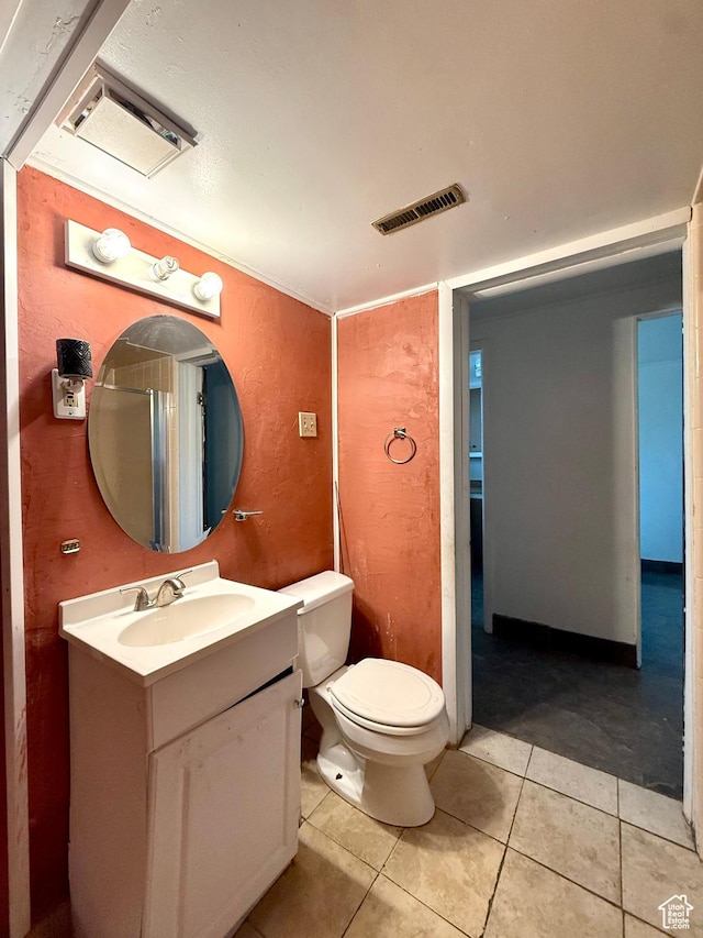 4203 S 4900 W, West Valley City, UT 84120 - bathroom with vanity, toilet, tile patterned floors, and a textured wall