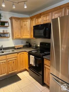 685 N 340 W, Orem, UT 84057 - kitchen with black appliances, a sink, light tile patterned floors, and open shelves