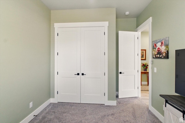 653 S 1140 E, Smithfield, UT 84335 - unfurnished bedroom with baseboards, carpet flooring, and a closet