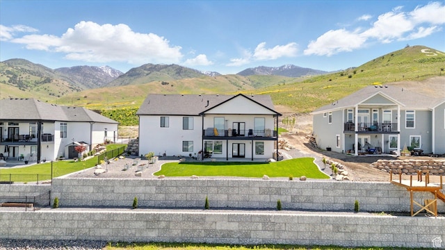 653 S 1140 E, Smithfield, UT 84335 - modern farmhouse with a balcony, a mountain view, a patio, and a residential view