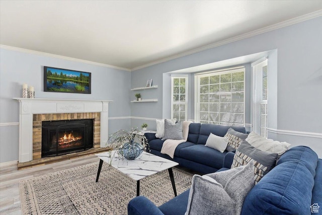 719 N 400 W, Orem, UT 84057 - living room with light wood finished floors, ornamental molding, a fireplace, and baseboards