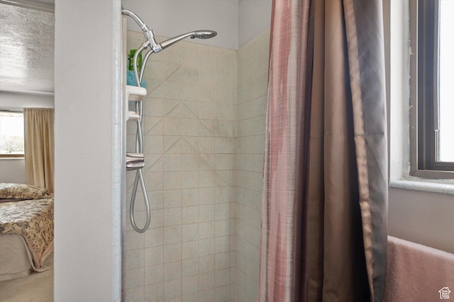 2263 W 4400 S, Roy, UT 84067 - bathroom featuring a tile shower and a textured ceiling