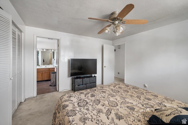 2263 W 4400 S, Roy, UT 84067 - bedroom with light carpet, ensuite bath, ceiling fan, and a closet