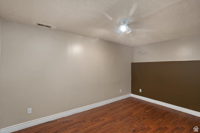 2263 W 4400 S, Roy, UT 84067 - unfurnished room with wood finished floors, a textured ceiling, baseboards, and ceiling fan