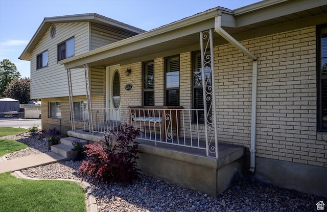2263 W 4400 S, Roy, UT 84067 - view of front of house with a porch and brick siding