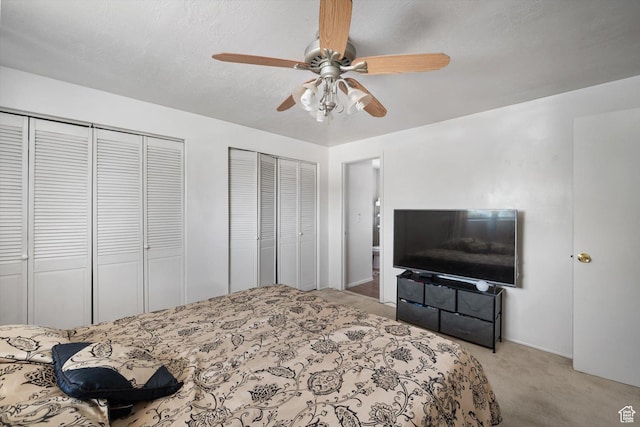 2263 W 4400 S, Roy, UT 84067 - bedroom with multiple closets, carpet flooring, and a ceiling fan