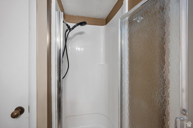 2263 W 4400 S, Roy, UT 84067 - bathroom view of a shower stall and a textured ceiling