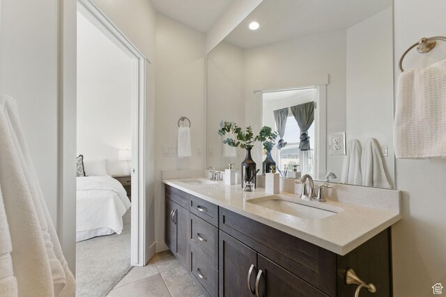 11398 Lake Run Rd, South Jordan, UT 84095 - ensuite bathroom with double vanity, tile patterned flooring, and recessed lighting