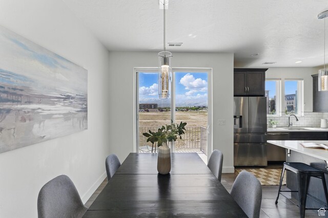 11398 Lake Run Rd, South Jordan, UT 84095 - dining area with baseboards