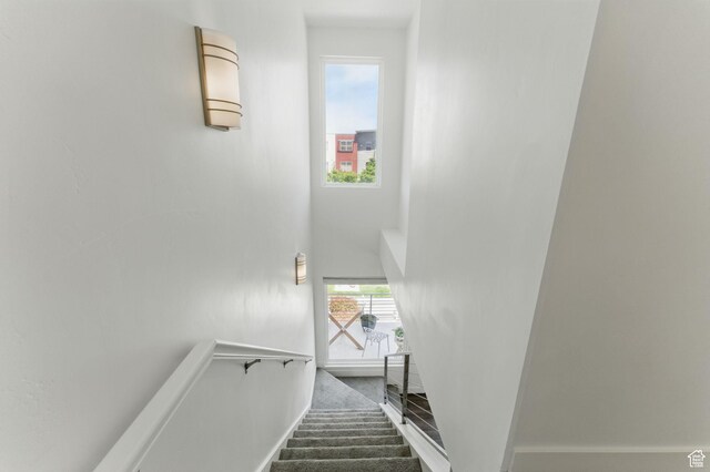 11398 Lake Run Rd, South Jordan, UT 84095 - stairs with baseboards and a towering ceiling