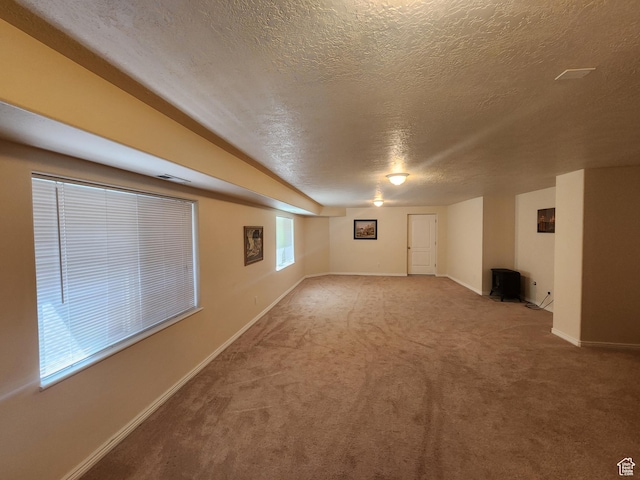 3368 N 700 E, Lehi, UT 84043 - below grade area featuring a textured ceiling, carpet, and baseboards