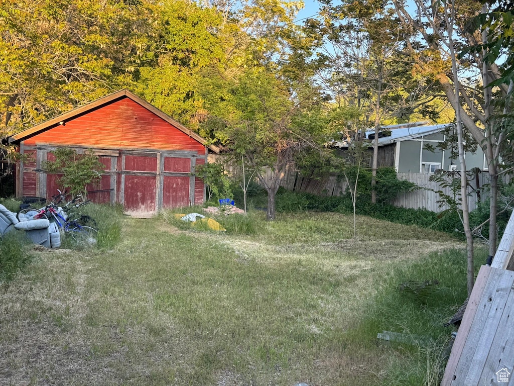 70 N 200 E, Spanish Fork, UT 84660 - view of yard with a detached garage, an outbuilding, and a pole building