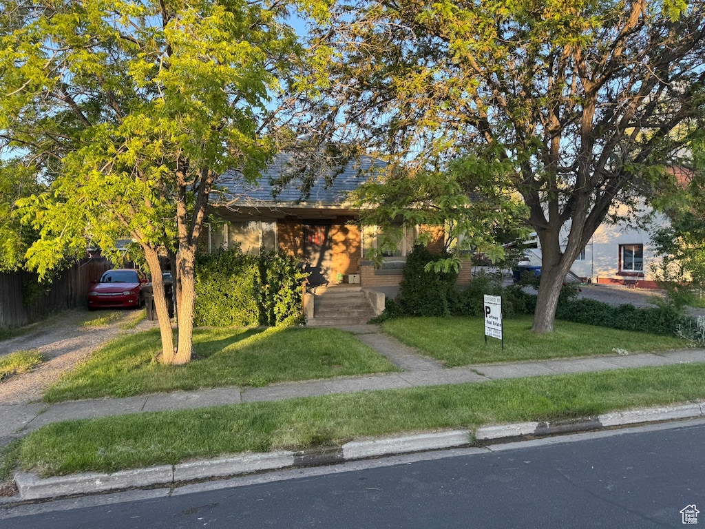 70 N 200 E, Spanish Fork, UT 84660 - view of property hidden behind natural elements with dirt driveway