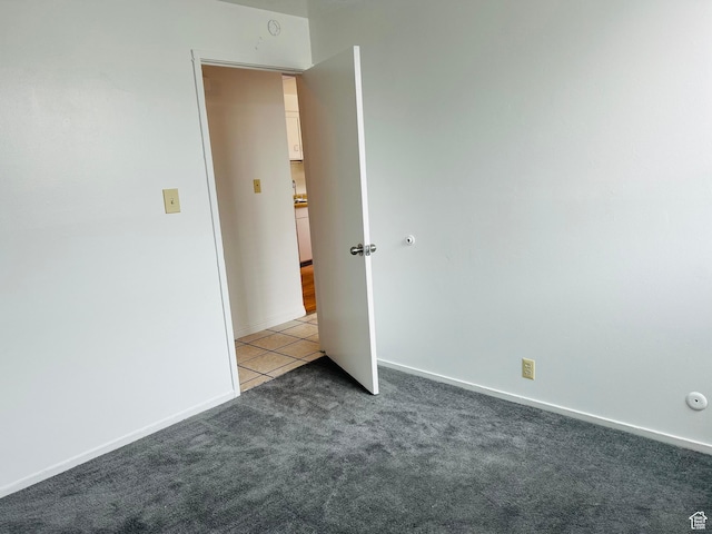 4419 S Rosehaven Ct Unit A, West Valley City, UT 84120 - carpeted spare room with baseboards