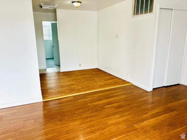 4419 S Rosehaven Ct Unit A, West Valley City, UT 84120 - empty room featuring wood finished floors and baseboards