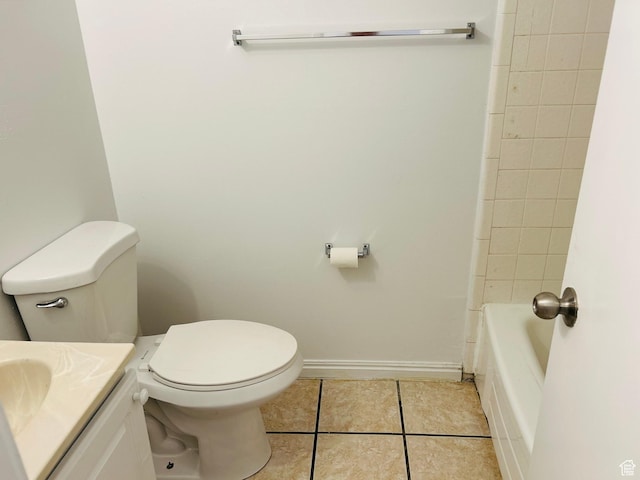 4419 S Rosehaven Ct Unit A, West Valley City, UT 84120 - full bathroom featuring tile patterned flooring, vanity, toilet, and baseboards