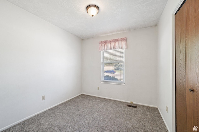 621 N 100 W, American Fork, UT 84003 - unfurnished bedroom with carpet, a closet, baseboards, and a textured ceiling
