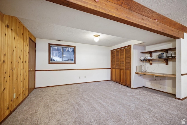 621 N 100 W, American Fork, UT 84003 - finished basement with carpet flooring, wood walls, a textured ceiling, and baseboards