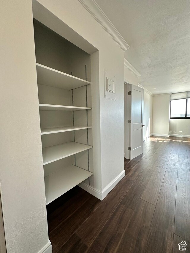 241 N Vine St E Unit 207W, Salt Lake City, UT 84103 - corridor with wood finished floors, crown molding, and a textured ceiling