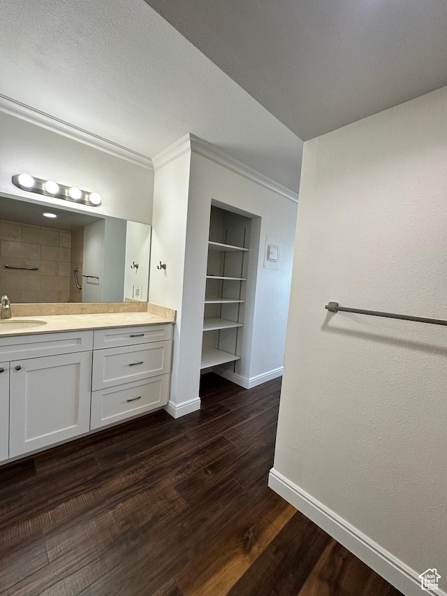 241 N Vine St E Unit 207W, Salt Lake City, UT 84103 - full bath with vanity, built in features, wood finished floors, and ornamental molding