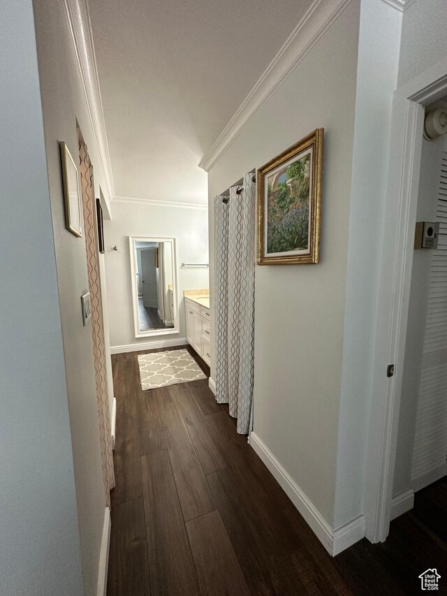 241 N Vine St E Unit 207W, Salt Lake City, UT 84103 - hallway with ornamental molding, dark wood-style flooring, and baseboards